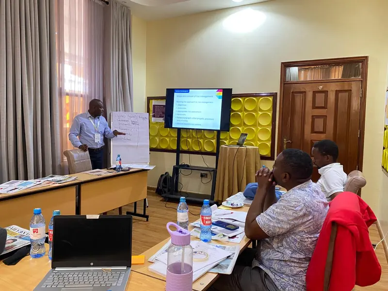 Delegates facing a presentation screen during a Fundamentals of Risk Management cohort in Naivasha, September 2024.